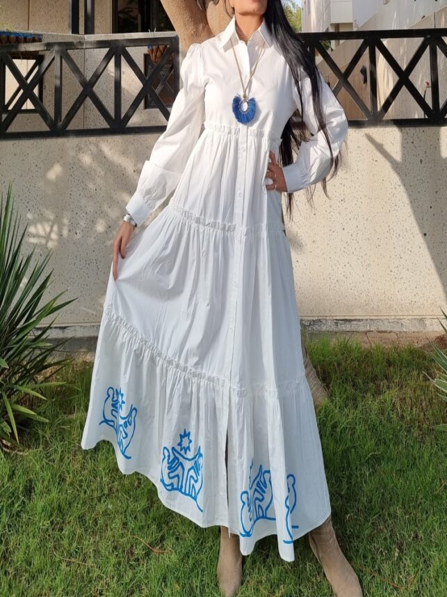 White long sleeve style dress w/ blue print on the bottom