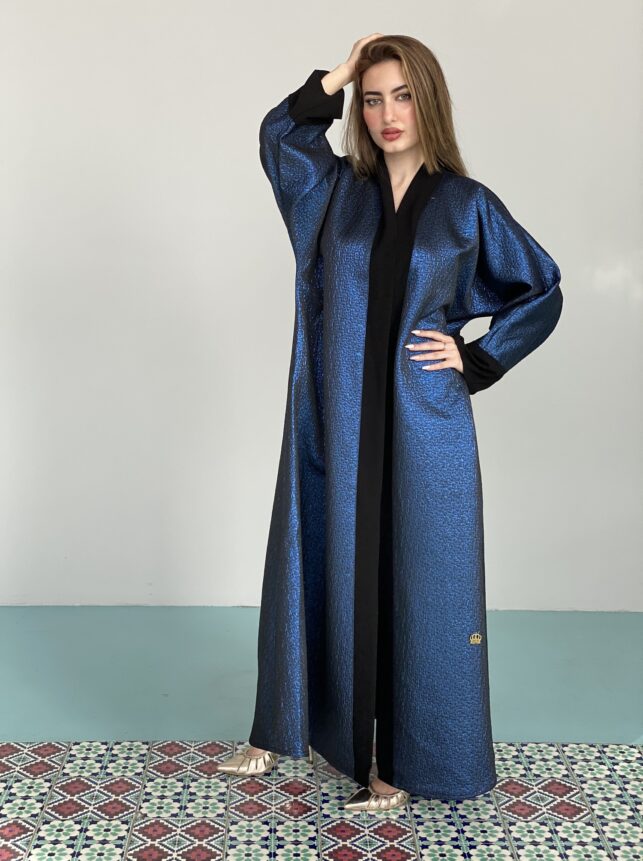 "A line style glossy blue with black crepe materials"