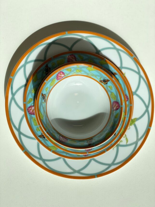 Set of round printed ceramic plates