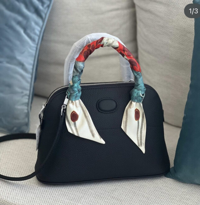Halfmoon leather handy or sling bag, customized with elegant designs